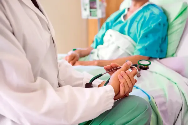 Individual reviewing critical illness insurance